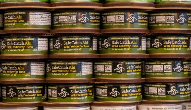 New York NY USA-November 11, 2024 A display of SafeCatch Ahi wild yellowfin low mercury tuna in avocado oil cans clipart