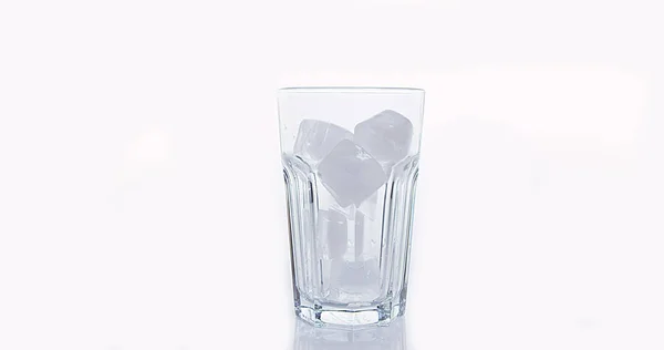 Ice Cubes Falling Glass White Background — Stock Photo, Image