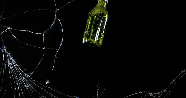 Bottle Beer Breaking Pane Glass Black Background — Stock Photo, Image