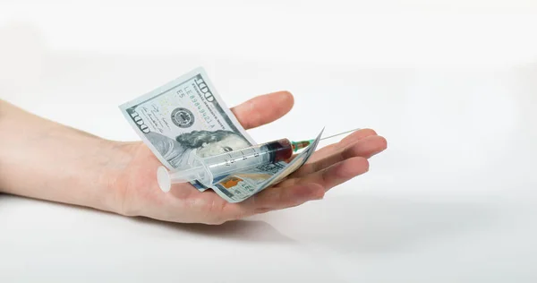 Шприц Падающий Руки Долларами Белом Фоне — стоковое фото