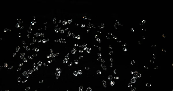 Berlian Jatuh Melawan Black Background — Stok Foto
