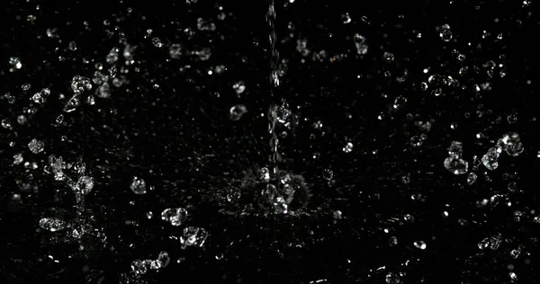 Acqua Che Salta Sullo Sfondo Nero — Foto Stock
