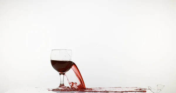 Glass Red Wine Breaking Splashing White Background — Stock Photo, Image
