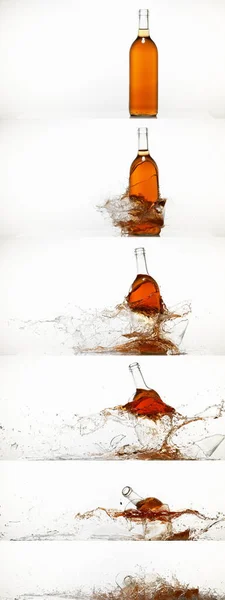Flasche Mit Rosa Wein Zerbricht Und Spritzt Vor Weißem Hintergrund — Stockfoto
