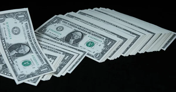 Dólar Americano Notas Caindo Contra Fundo Preto — Fotografia de Stock