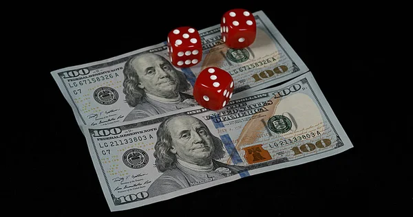 Red Dice Rolling Dollar Bills Black Background — Stock Photo, Image