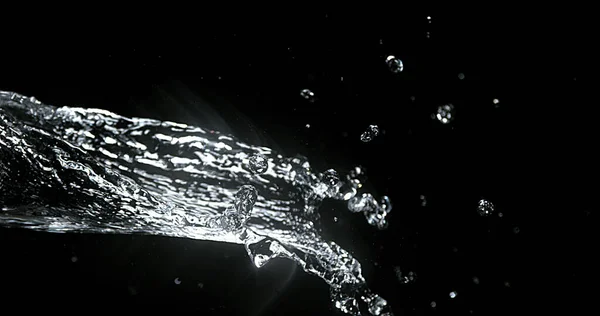 黒背景を噴出水 — ストック写真