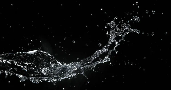 Víz Spurting Fekete Háttérrel — Stock Fotó