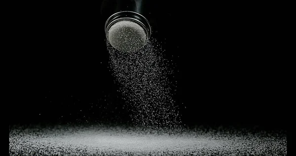 Weißer Zucker Vor Schwarzem Hintergrund — Stockfoto
