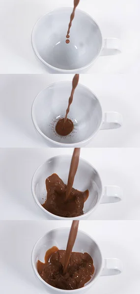 Chocolate Derramando Uma Tigela Contra Fundo Branco — Fotografia de Stock