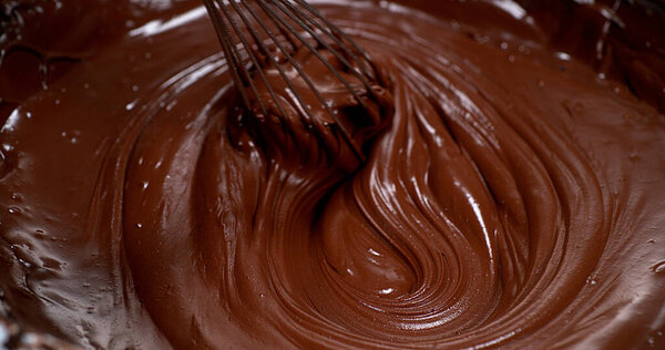 Whisk Turning Milk Chocolate