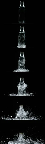 Bottle Falling and exploding on Black Background