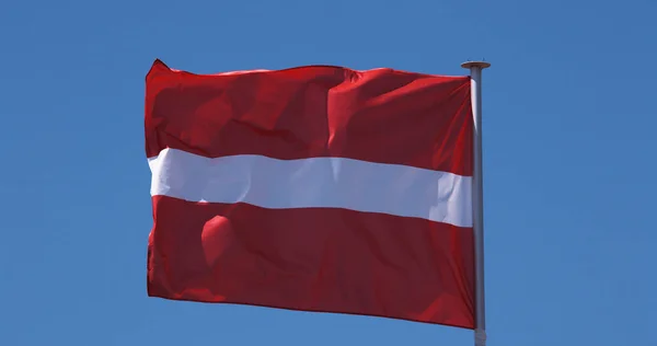 Latvian Flag Waving Wind Blue Sky — Stock Photo, Image