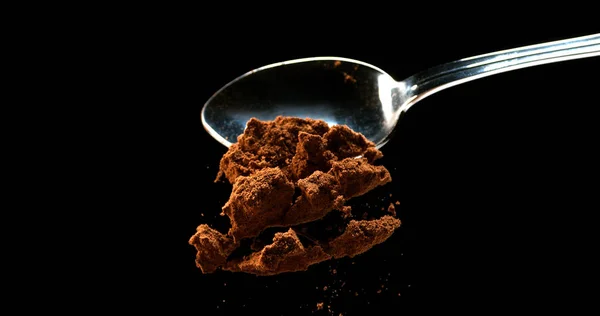 Nutmeg Myristica Fragans Powder Falling Spoon Black Background — Stock Photo, Image