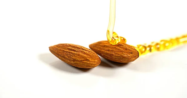 Honey Flowing Almonds White Background Stock Picture