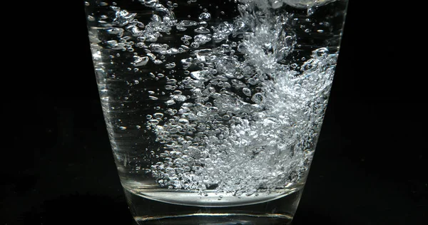Water Being Poured Glass Black Background — Stock Photo, Image
