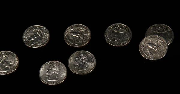 Quarter Dollar Coins Falling Rolling Sliding Black Background — Stock Photo, Image
