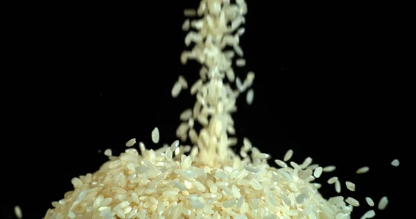 Rice Falling Black Background — Stock Photo, Image