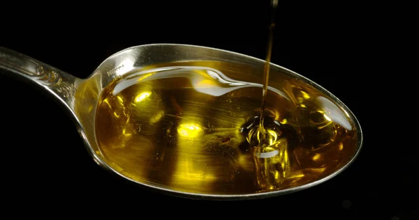 Olive Oil Falling Spoon Black Background — Stock Photo, Image