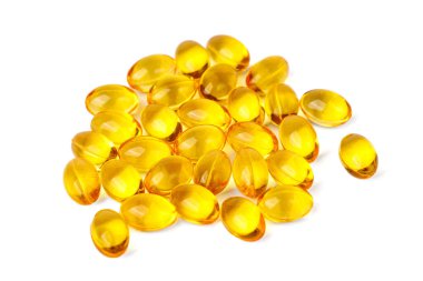 Yüksek kaliteli fotoğraf, parlak sarı D vitamini kapsüllerinin yakın çekimi, sağlığın ve sağlığın teşvik edilmesi, temiz beyaz bir arkaplanda izole edilmiş.. 