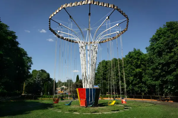 stock image Big round swing in the amusement park in the summer, Ukraine, Kropivnitskiy