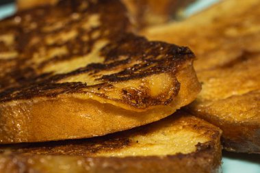 Fresh sweet toast fried with egg.