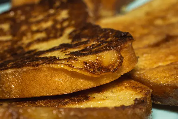 Fresh sweet toast fried with egg.
