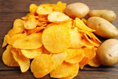 Potato chips fried snack unhealthy fast food.