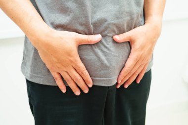 Fıtık, Asyalı erkek mide ağrısı, karın ağrısı ve üroloji problemi..