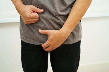 Fıtık, Asyalı erkek mide ağrısı, karın ağrısı ve üroloji problemi..