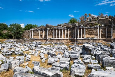Side Ancient Ruins touristic site in the popular resort town of Side, near Antalya, Turkey. Ancient Greek and Roman style ruin.