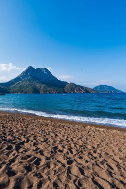 Adrasan beach landscape with mountain, one of the most popular beaches of Antalya - Antalya, Turkey. Beach in Turkey