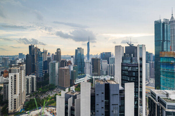 Kuala Lumpur, Malaysia - December 2022: Kuala Lumpur city scape with skyscrapers and KL tower. Kuala Lumpur skyline