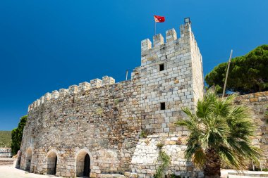 Eski Foca Castle view on the Aegean coast, Izmir, Turkey. Eski Foca is a popular seaside resort town in Turkey clipart