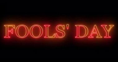4K Fools 'Day, havalı renkli animasyon metni. Neon renkli Aptallar Günü metni, afiş için parlayan bir neon, sosyal medya duvar kağıdı hikayeleri. Teknoloji video animasyonu. Kullanımı kolay.