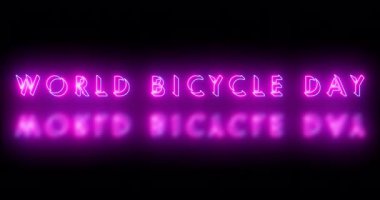 4K Dünya Bisiklet Günü metin serin neon renkli animasyon. Neon renkli Dünya Bisiklet Günü metni, afiş için parlayan bir neon, sosyal medya duvar kağıdı hikayeleri. Teknoloji video materyali.