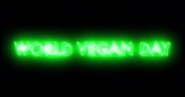 Dünya Vegan Günü metin animasyonu 4K. Neon World Vegan Day metni online dükkanlar, bloglar, web, kafeler, reklamlar ve oteller için mükemmel. Teknoloji video materyali animasyonu.
