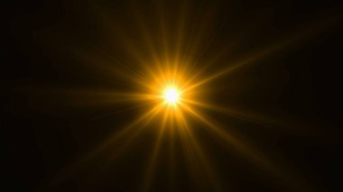 Güzel hareket eden el feneri. Ödüller, lüks, reklamlar ve film için arka planda parlak ışınlar. Soyut el feneri. Siyah arkaplanda fotoğrafçıların görüntüleri..