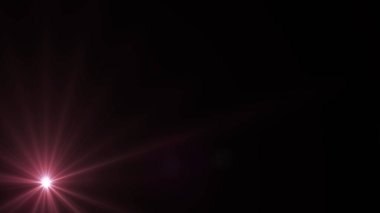 Güzel hareket eden el feneri. Ödüller, lüks, reklamlar ve film için arka planda parlak ışınlar. Soyut el feneri. Siyah arkaplanda fotoğrafçıların görüntüleri..