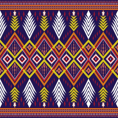 Çok renkli eski kabile kumaşının dikişsiz deseni. Etnik geometrik Soyut Aztek Navajo çizgileri ve mavi arka planda çizgiler. Batik Sarong İpek Duvar Kağıdı Perdesi Tekstil Tasarımı