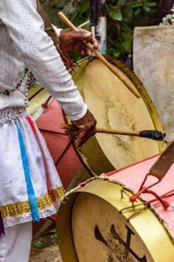 Musicians with colorful drums on the streets of Brazil during a popular festival clipart