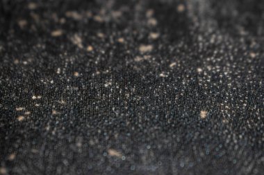 Arkaplan tasarımı, soyut sanat veya yaratıcı projelerde kullanıma uygun desenli siyah yüzey nötr ve çok yönlü görsel estetik bir model sunuyor.