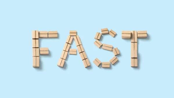 Word Fast Tillverkad Kartonger Blå Bakgrund — Stockfoto