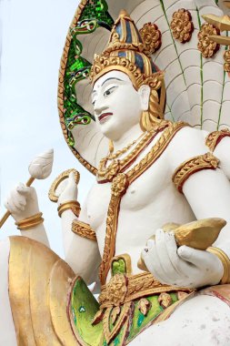 Close-up of a beautifully crafted Hindu deity statue showcasing intricate details and cultural artistry. clipart