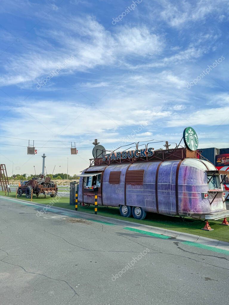 Dubai, United Arab Emirates - March 2, 2024: Starbucks Coffee Truck at the Last Exit food trucks park on the highway in United Arab Emirates. High quality photo