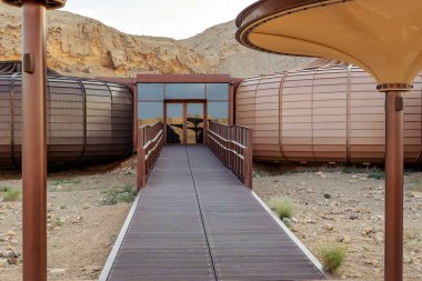 Sharjah 'taki Buhais Jeoloji Parkı, doğal kaya oluşumlarıyla bölgenin eşsiz jeolojik mirasını vurguluyor. Sharjah, Birleşik Arap Emirlikleri - 2 Aralık 2024. Yüksek kalite fotoğraf