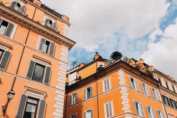 Architecture of Rome. A building with the characteristic ocher facade. Trastevere district