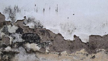 Yıpranmış beton duvar, eskimiş çimento dokusu, tasarım elementleri için sert taş yüzey.