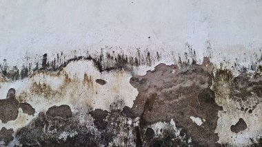 Soyut grunge yüzeyi ve sanayi görselleri için yıpranmış taş duvar ile sorunlu beton doku arka planı