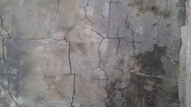 Soyut grunge yüzeyi ve sanayi görselleri için yıpranmış taş duvar ile sorunlu beton doku arka planı